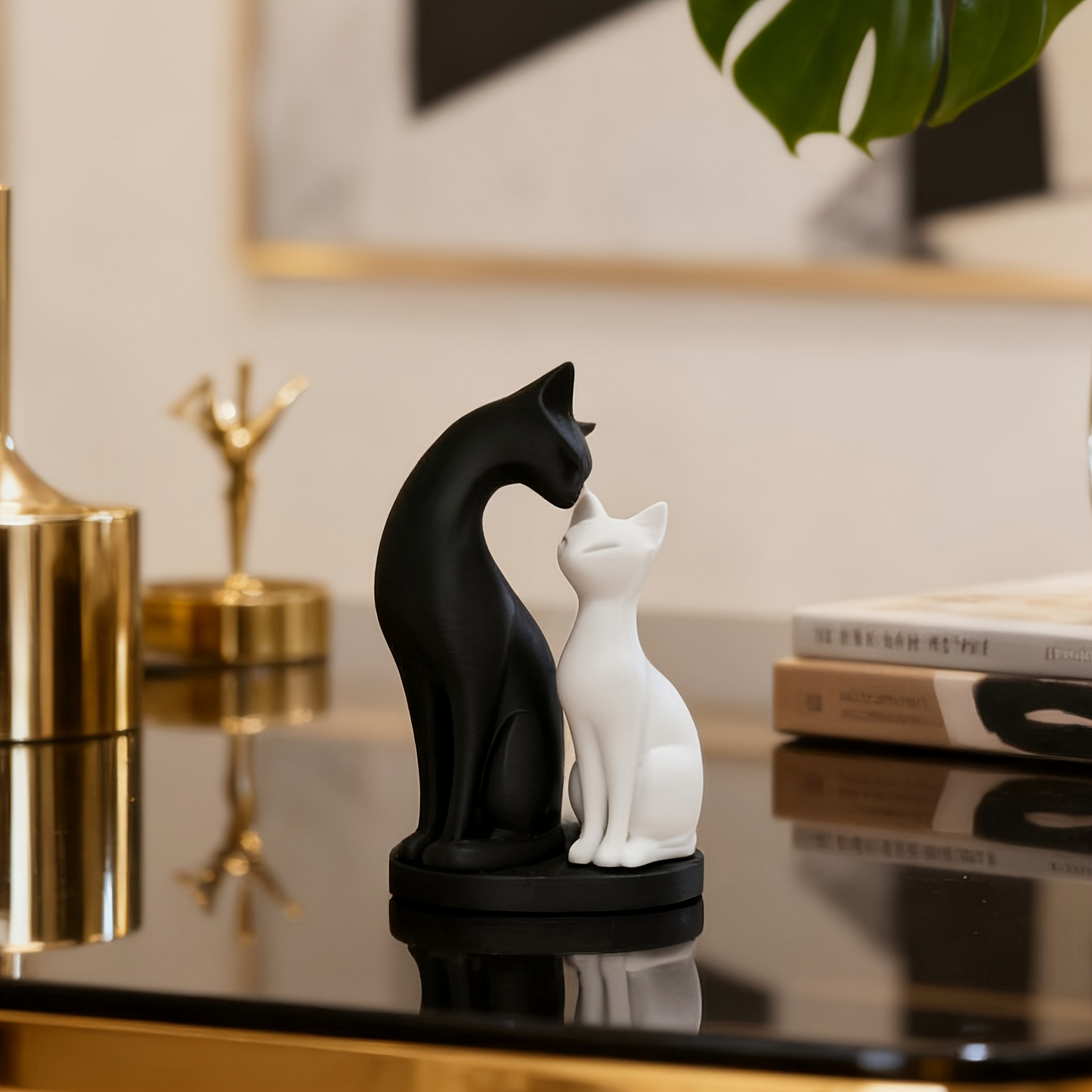 Black and white cat couple sculpture