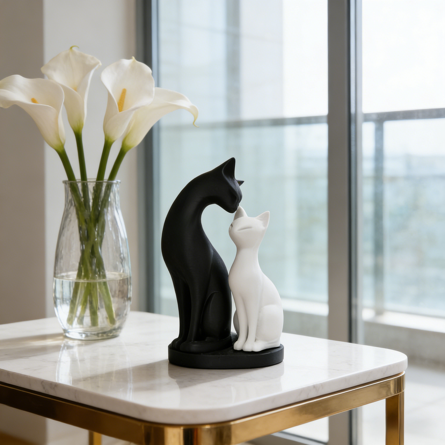 Black and white cat couple sculpture